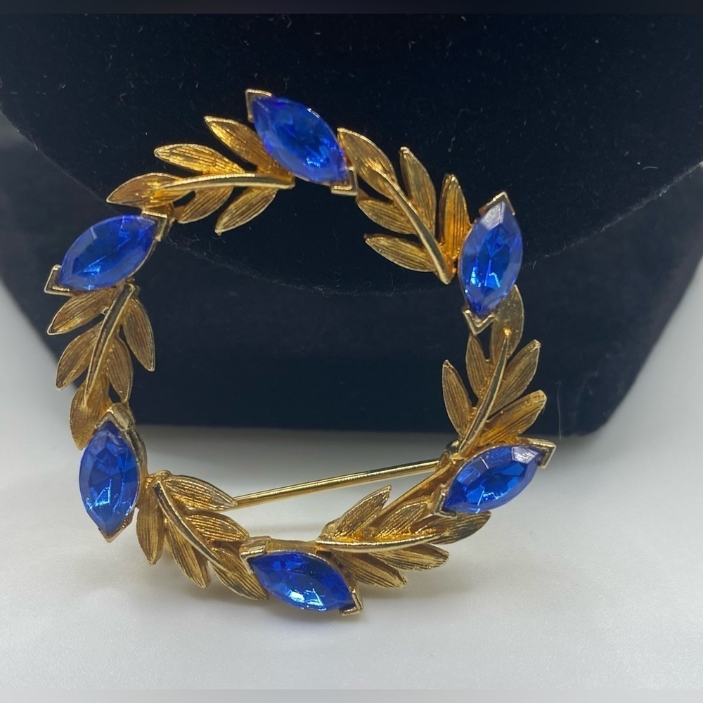 Vintage Faux Blue Sapphire Navette Rhinestone Goldtone Leaf Wreath Brooch Pin